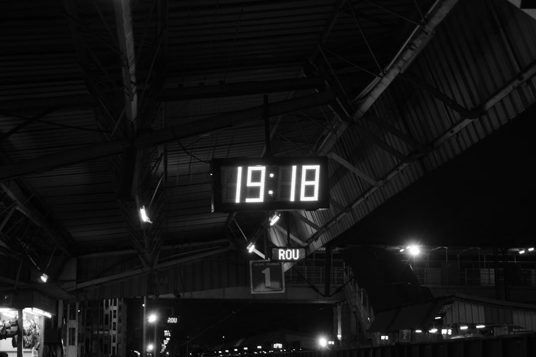 a black and white photo of a train station sql database timestamp automation