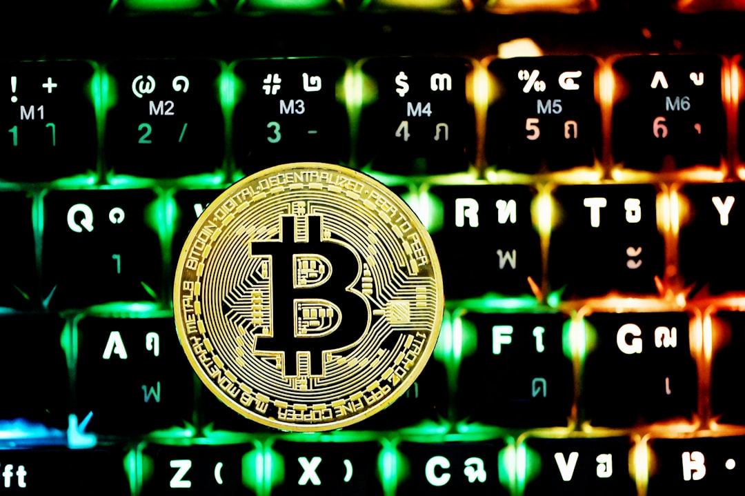 black and green computer keyboard online crypto education webinar investor studying charts laptop with bitcoin