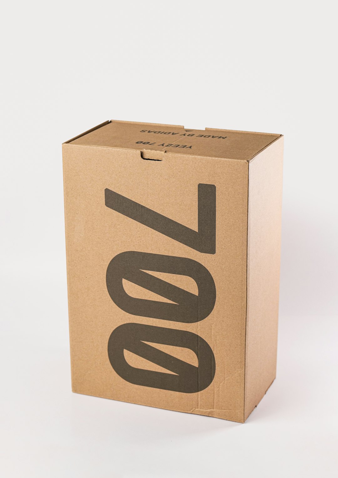 a cardboard box with a symbol on it product delivery ecommerce packaging dropshipping unpacking