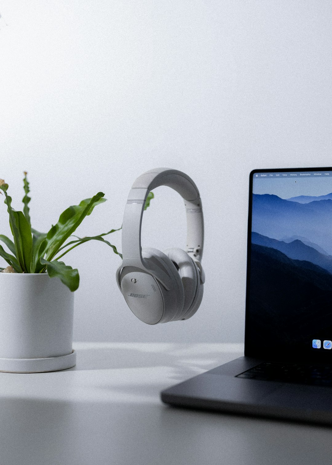 Headphones Not Showing in Playback Devices on Windows 10? Fix It Now! 1 a laptop computer sitting on top of a desk next to a plant windows 10 sound settings playback devices laptop screen