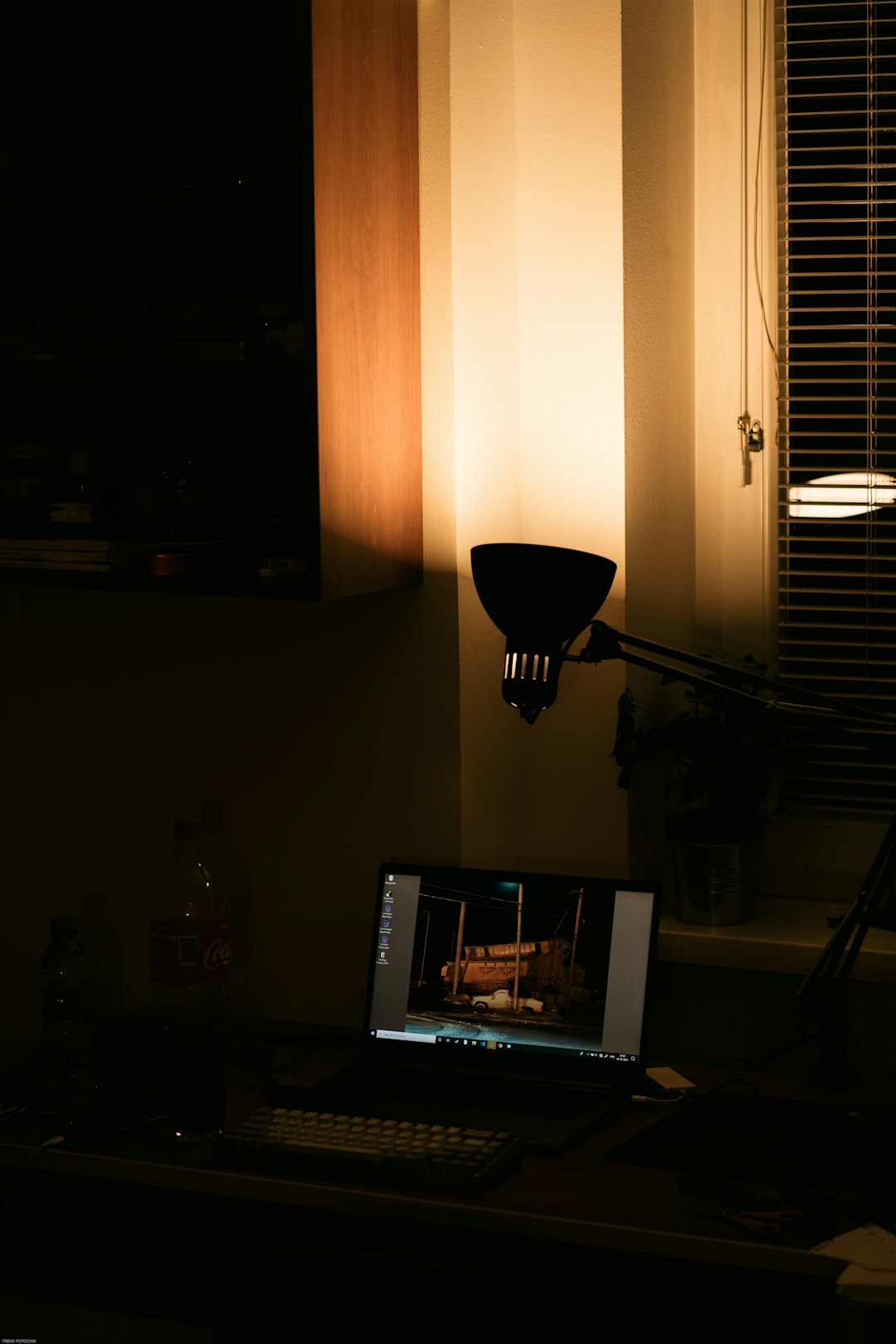 Best webcam settings for Zoom/Meet 1 a laptop computer sitting on top of a desk webcam setup ring light laptop camera