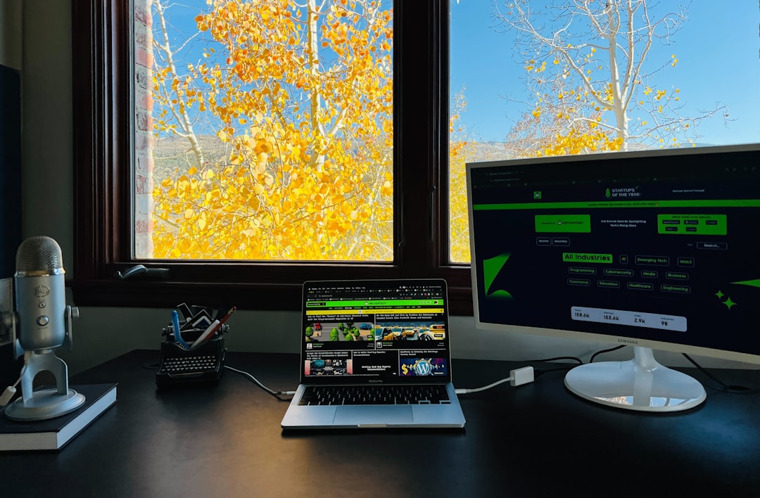 a laptop computer sitting on top of a desk windows media player task manager high cpu network service