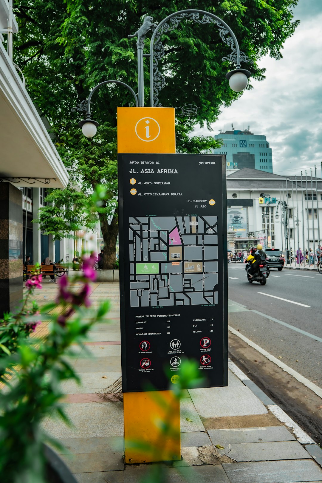 a sign on the sidewalk smartphone translation app travel city street