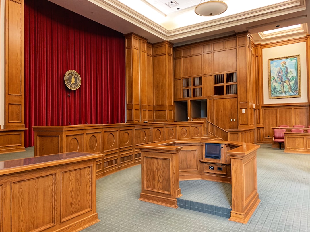Legal Consequences of Email Spamming: What You Need to Know 2 architectural photography of trial court interior view lawsuit courtroom spam email