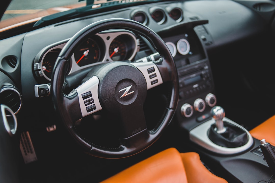 black and brown vehicle interior car dealership crm software automotive technology