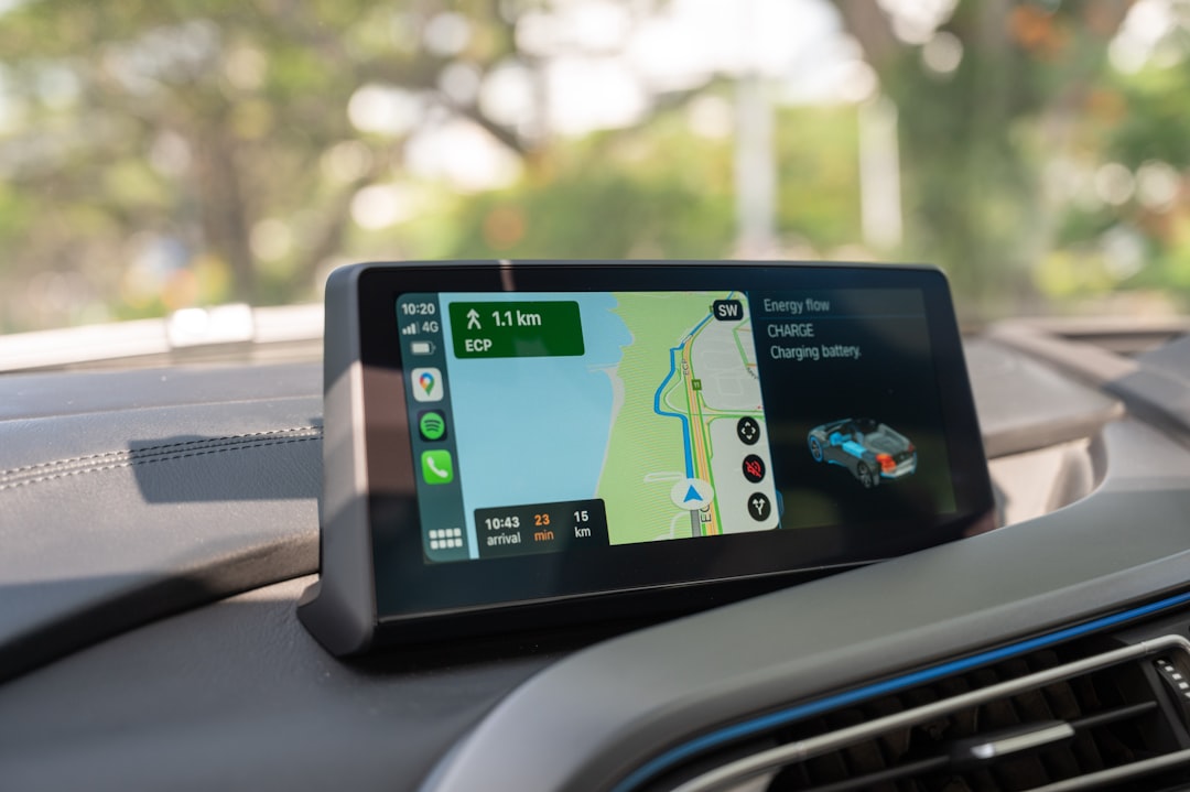 CarPlay vs Android Auto in 2025 2 black android smartphone on car dashboard android auto screen car tech google maps