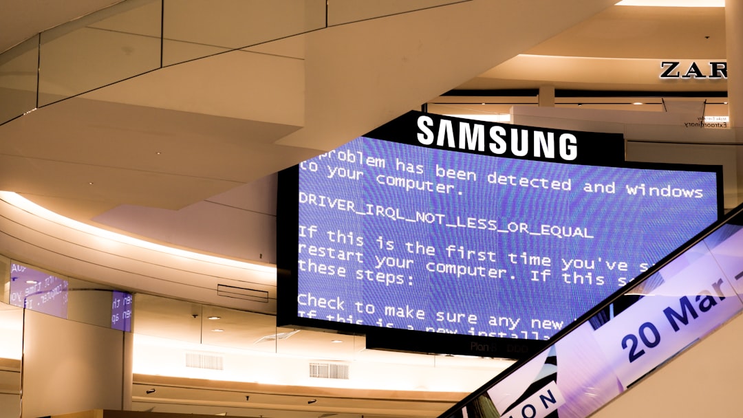 black samsung flat screen monitor turned on displaying boot sequence error windows error message screen system alert dialog dll file error