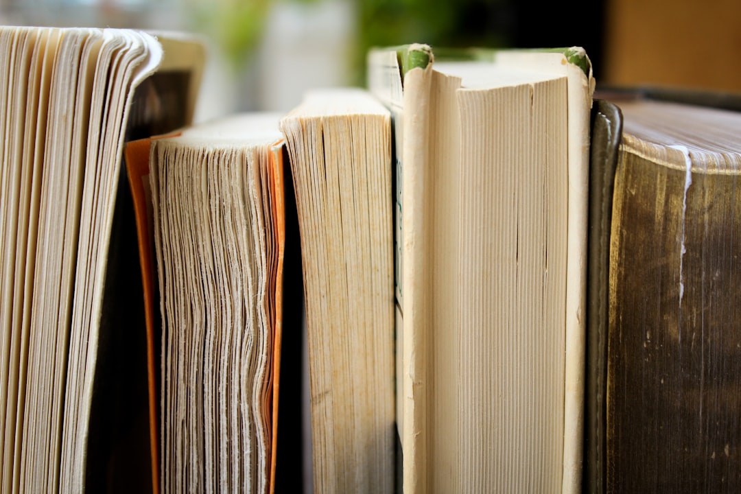 How to Troubleshoot Common Issues When Converting EPUB to Kindle for Smooth Reading 1 macro photo of five assorted books ebook formatting kindle reader epub view