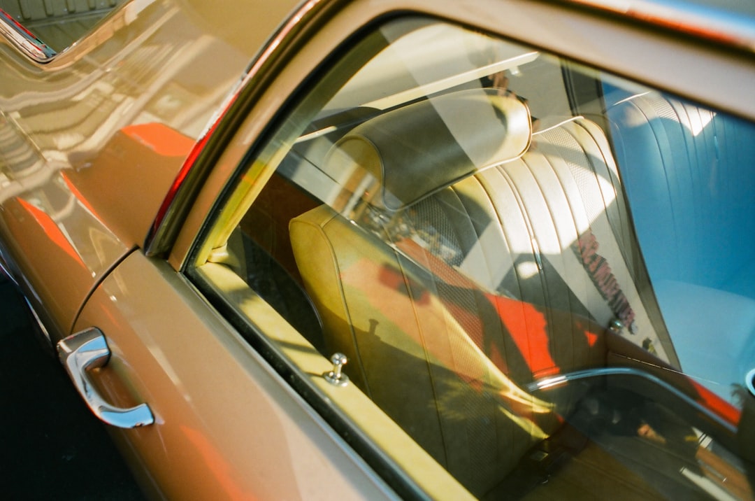 orange car with open door customer service auto showroom digital dashboard