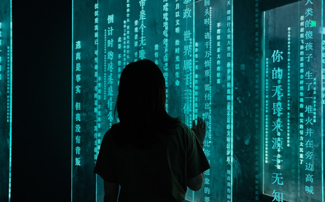 4 of the Most Difficult IT Certifications to Earn 3 silhouette of woman standing in front of blue light ethical hacking oscp cybersecurity penetration test