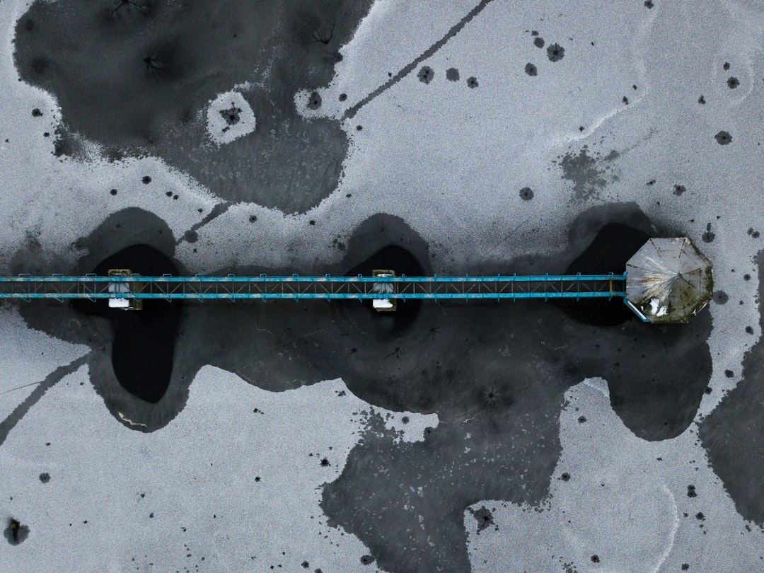 an aerial view of a boat in a body of water battle net launcher overwatch2 repair tool