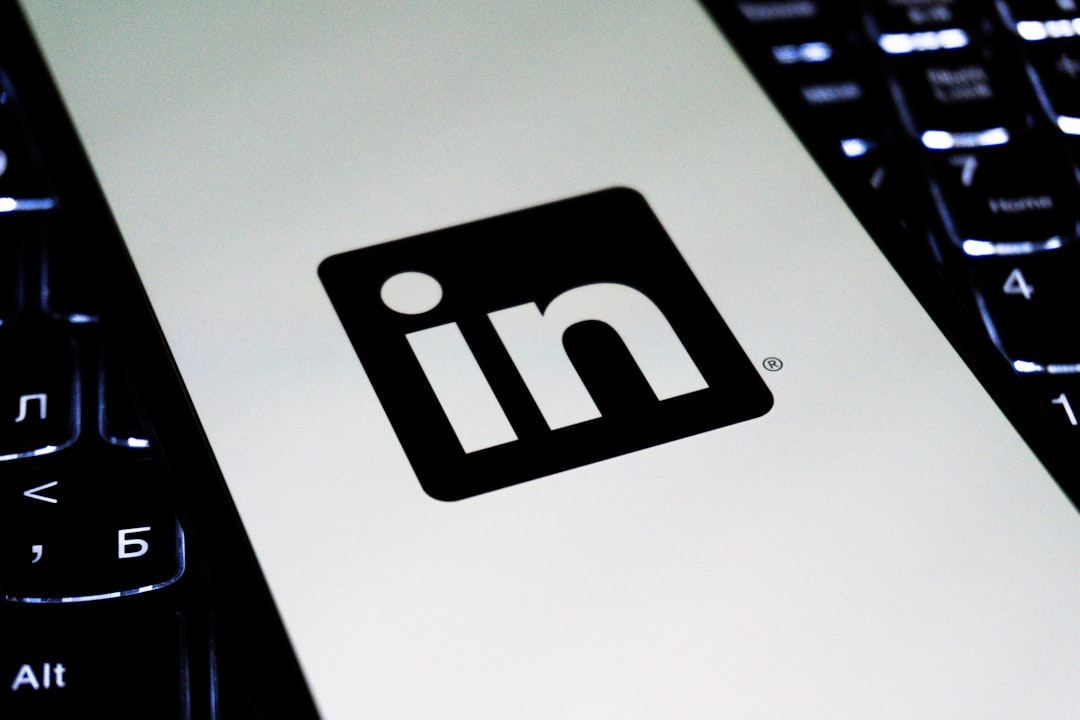 linkedin logo on a laptop keyboard social media search profile