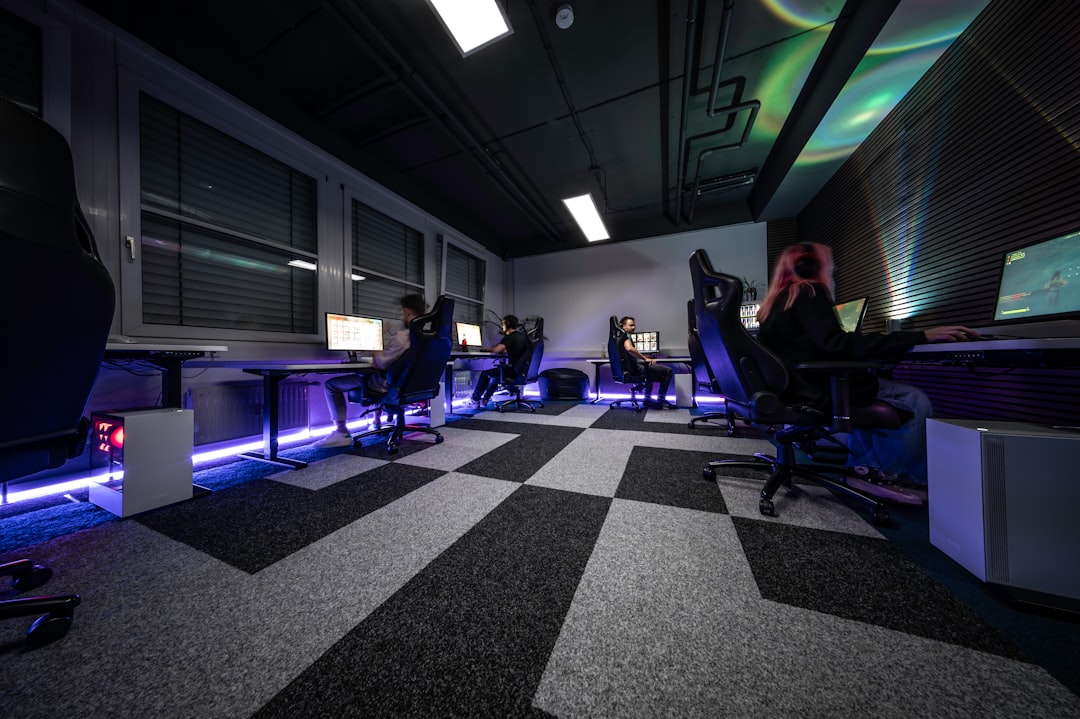 From Prompt Sharing to Plugin Building: What’s Happening on ChatGPT Forums in 2025 3 a group of people sitting at desks in a room corporate security training business professionals learning cyber defense teamwork