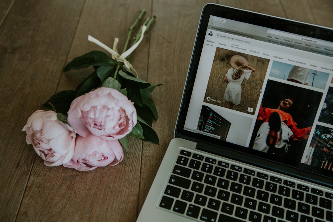 Is Pinterest Social Media? Insights for Affiliate Marketing 2 a laptop computer sitting on top of a wooden table pinterest marketing affiliate links strategy tips