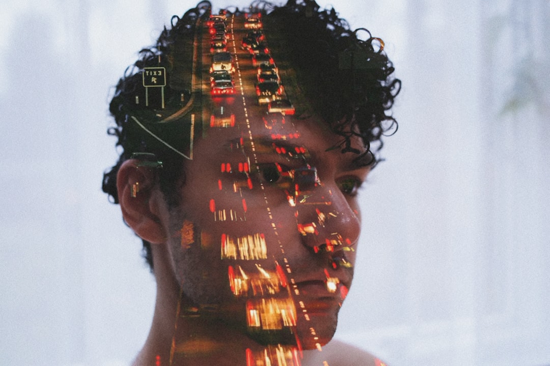 double exposure of mans face and traffic lights future technology artificial intelligence cybersecurity