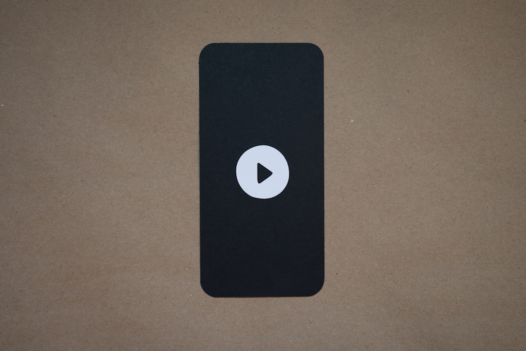 Does YouTube count views if you skip ads? 1 a black device with a play button on it youtube interface skip ad button video player
