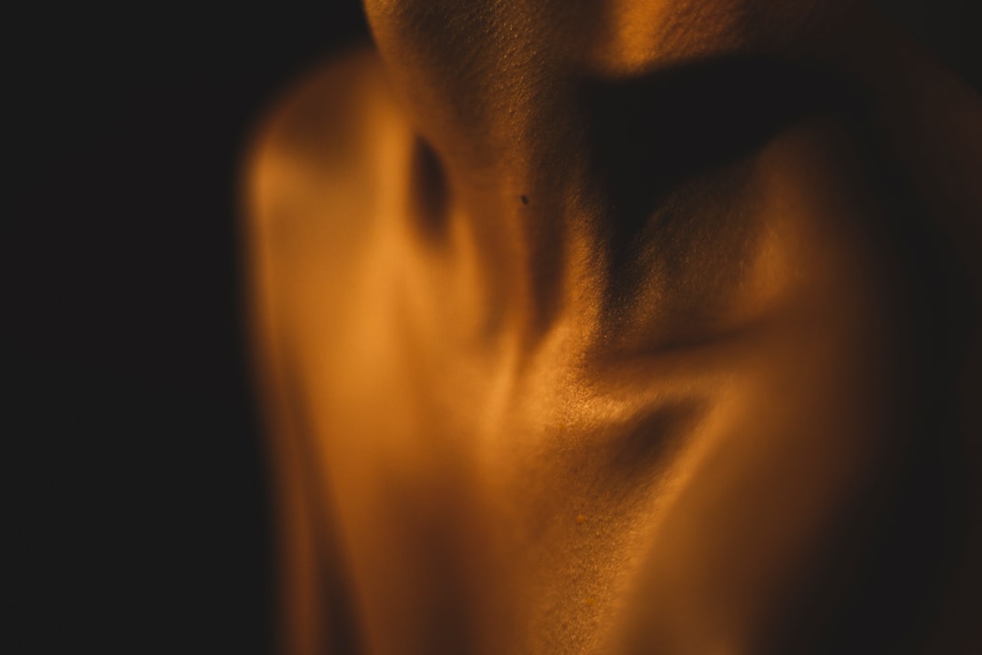 When Digital Art Meets Skin – Designing Tattoos With InkDrop AI 2 a blurry photo of a persons torso tattoo preview 3d body mapping tattoo simulation