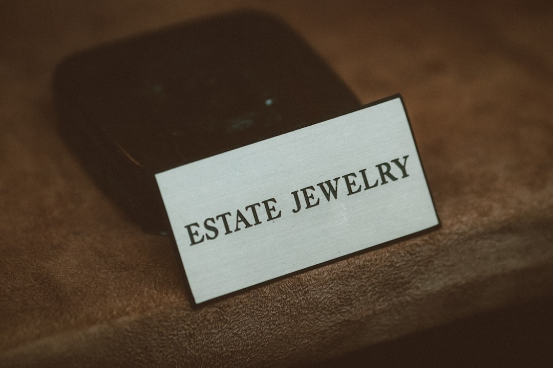 How to Add MLS Listings to WordPress with Divi 2 a cell phone sitting on top of a wooden table property detail page real estate info listing map