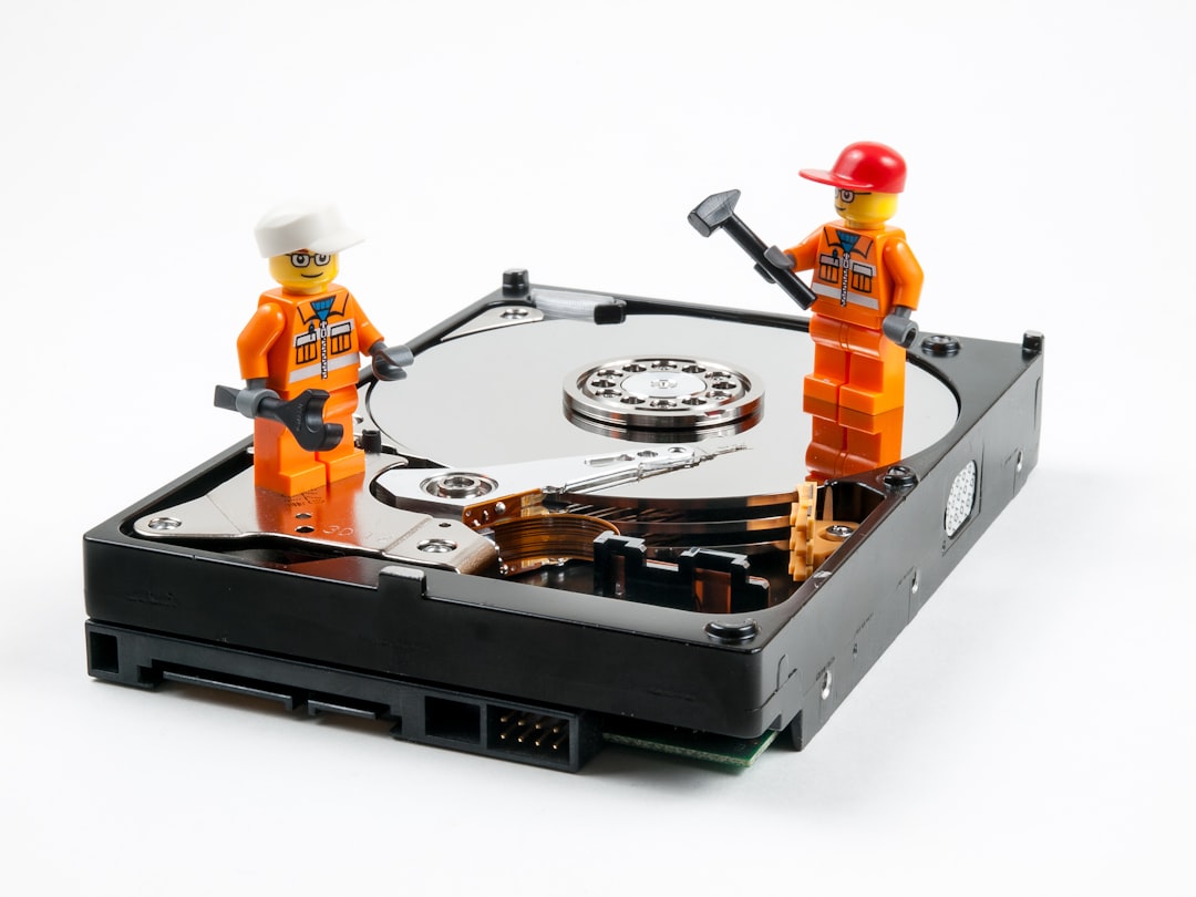 3uTools Not Working on iOS 18? Top Alternatives for You! 2 a couple of legos standing next to a hard drive backup system data recovery disaster recovery plan