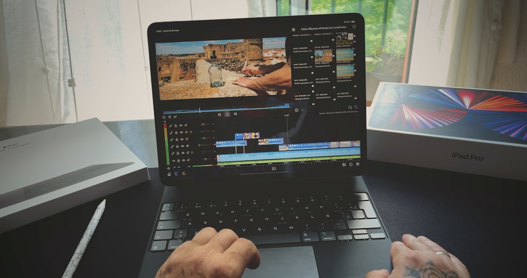 How do I edit a person in a video? 2 black and silver laptop computer add person to video green screen effect editing tools