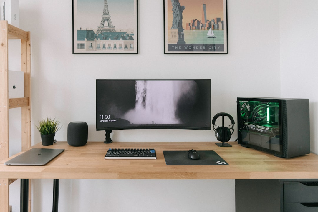 Is WPS Office still free? 1 black flat screen computer monitor on brown wooden desk gaming setup gamer pc desk
