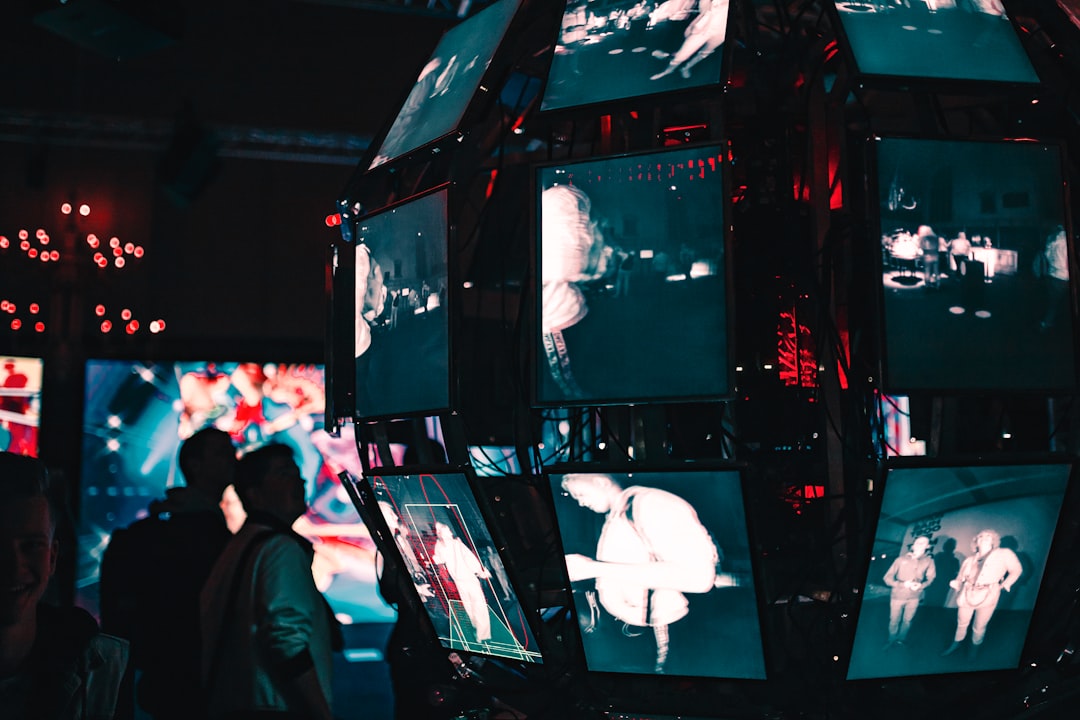 What are the predicted trends for VPN usage in 2025? 2 a group of people standing around a display of video screens digital transformation banking technology blockchain integration fintech growth