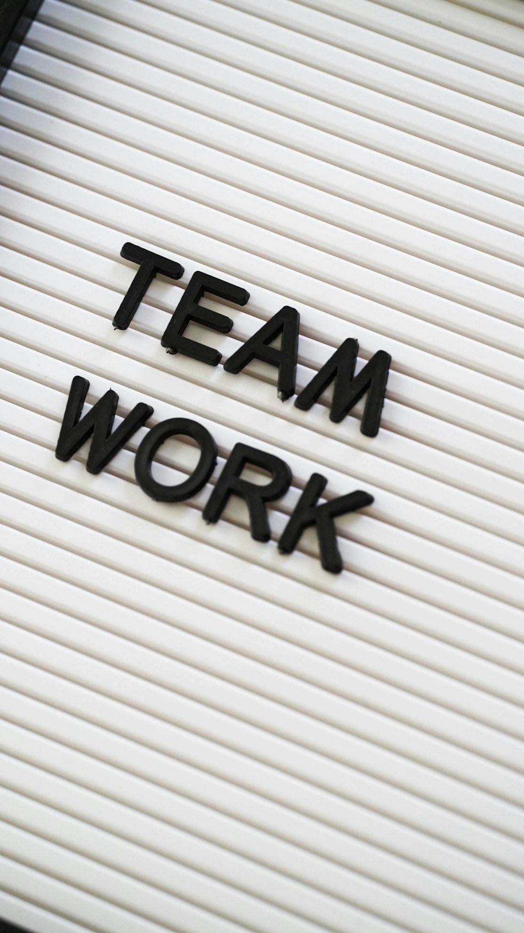 We Tested the 3 Best AI Tools for Product Managers in 2025 3 a sign that says team work on it agile board team collaboration sprint planning ai assistant