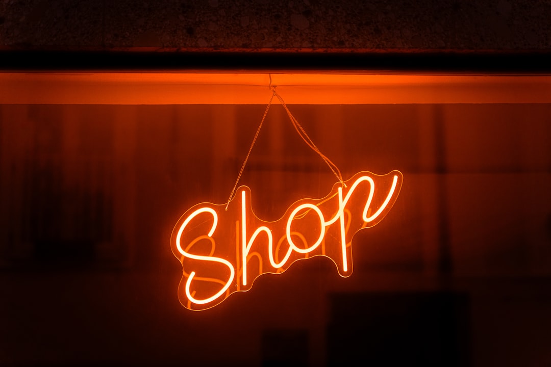 The 5 Best Shopify Sales Tracker Tools for 2025 2 a neon sign hanging from the side of a building shopify dashboard store analytics online sales