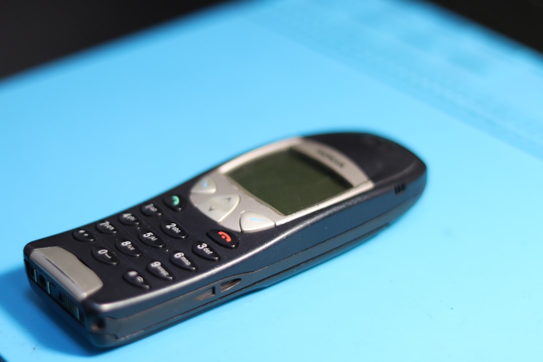 Galaxy A03s 2025 relevance 2 a vintage nokia phone rests on a blue surface low budget smartphone outdated phone features entry level user