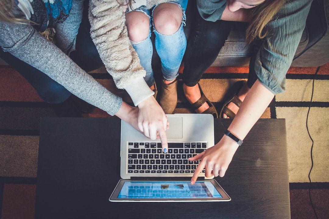 How do I fix Outlook sync errors on Mac? 3 three person pointing the silver laptop computer support professional tech help mac