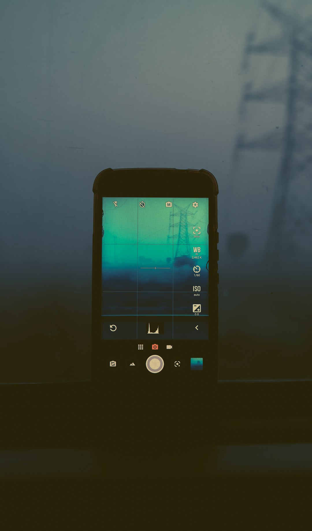 white android smartphone displaying icons phone interface camera icon app close up