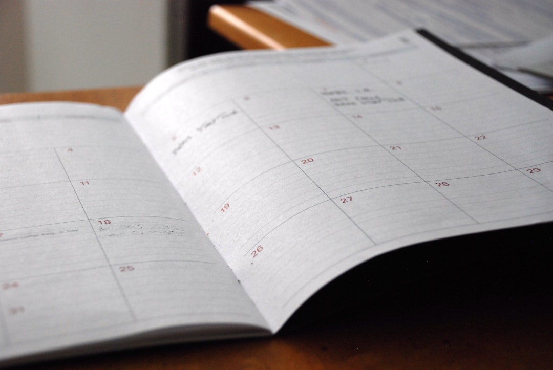 How can I utilize tools for Instagram content calendar planning? 2 white printer paperr notion calendar google sheets planner content schedule concept