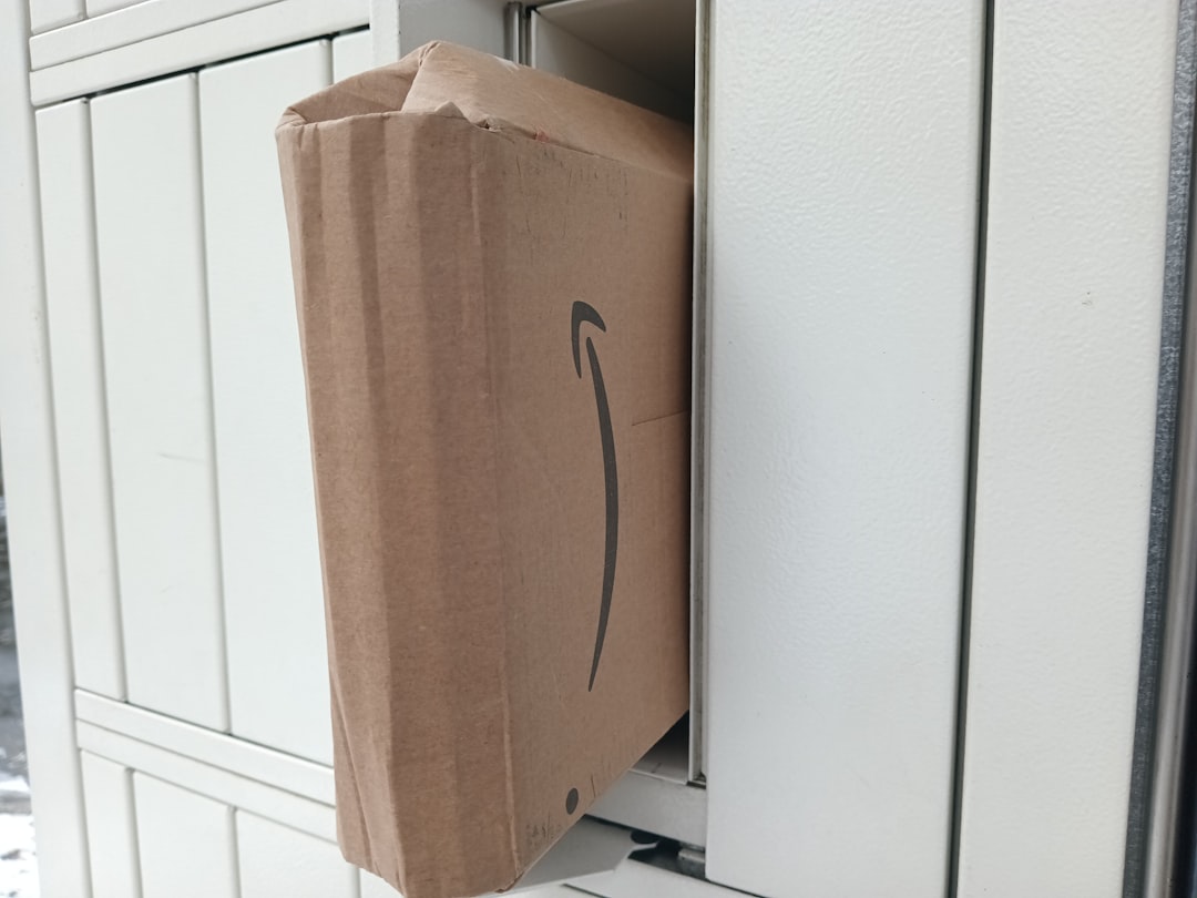 a brown cardboard box with an arrow drawn on it amazon uk delivery boxes online shopping