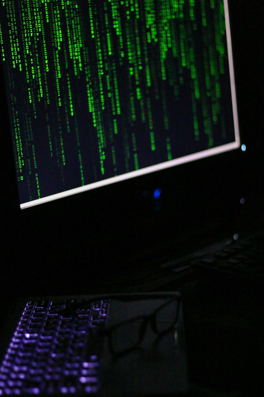 a computer monitor sitting on top of a desk hacker network breach password leak