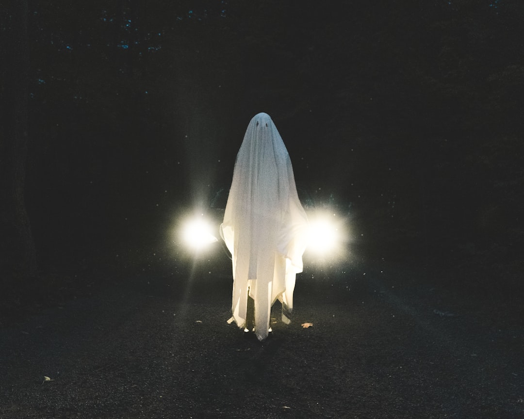 a person standing in the dark ghost blog minimal ui content editor