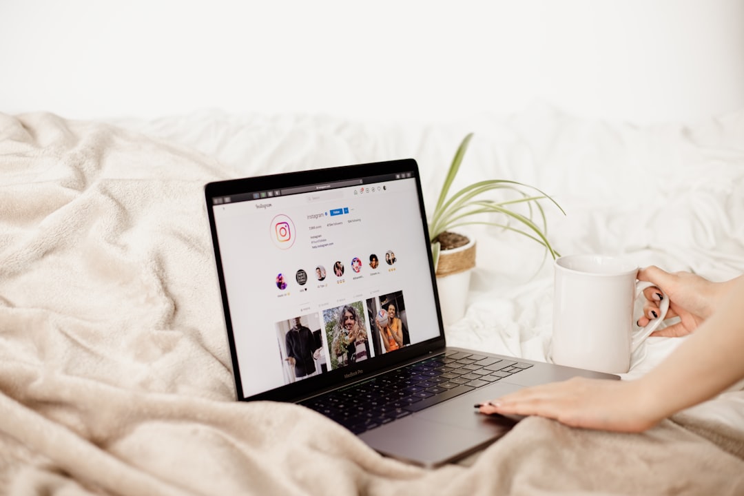 8 Ecommerce Pricing Strategies to Maximize Profits 2 a woman is holding a coffee cup and looking at her laptop online shopping new products ecommerce launch