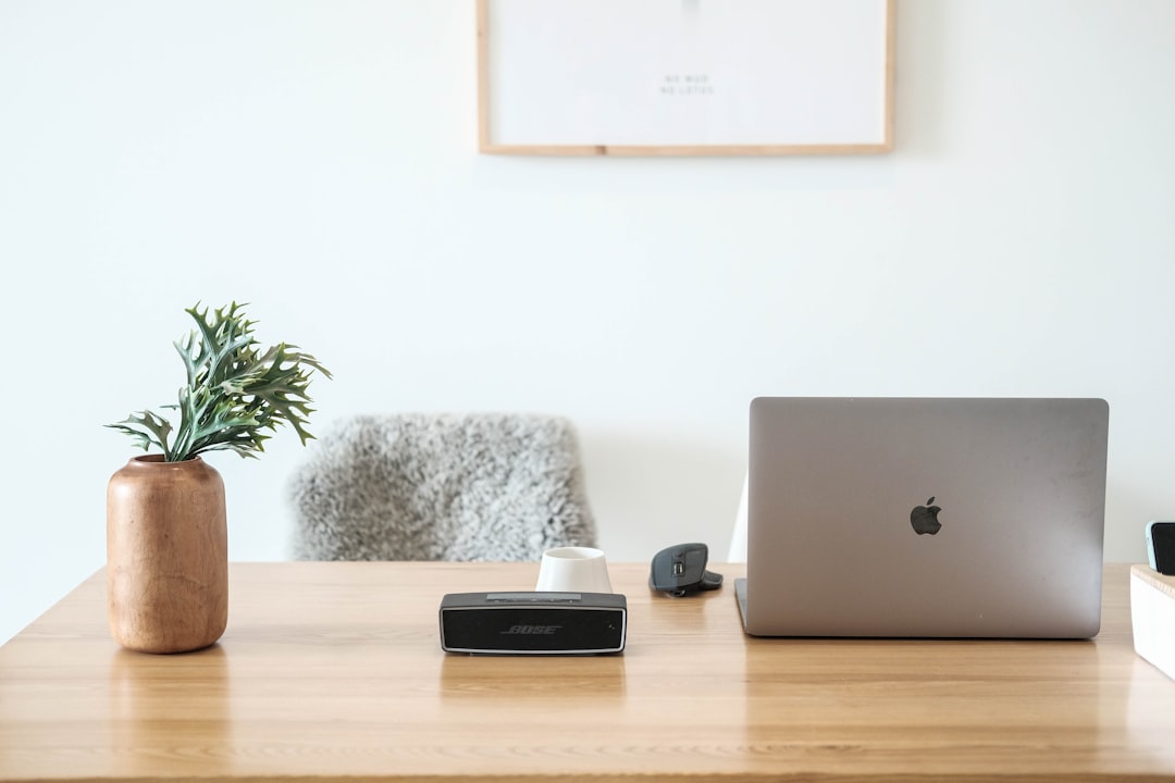 AI Assistants: Complete Comparison Guide 2025 2 macbook pro on brown wooden table smart home devices virtual assistant