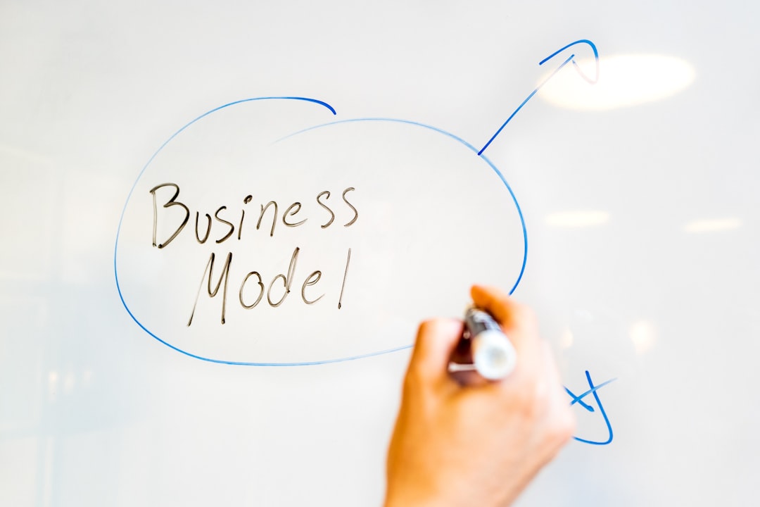 Online Ads Cost: Everything you need to know in 2025 3 person writing on white paper small business team performance evaluation digital workflow