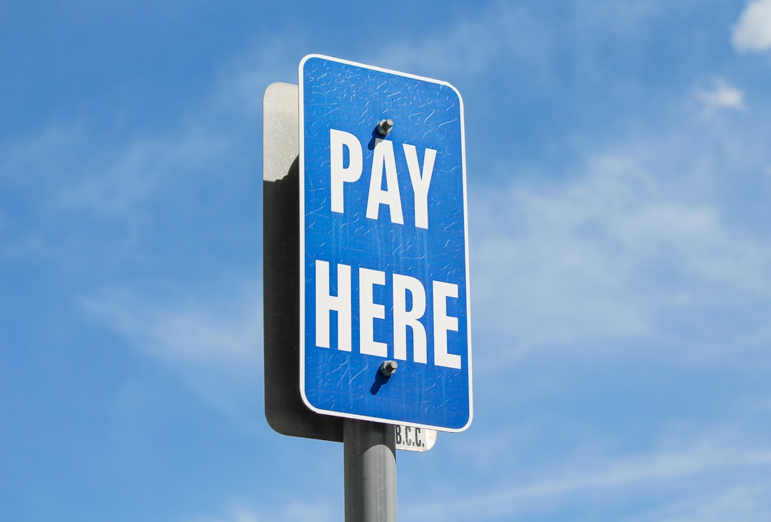 a blue sign with white text vpn payment comparison free paid