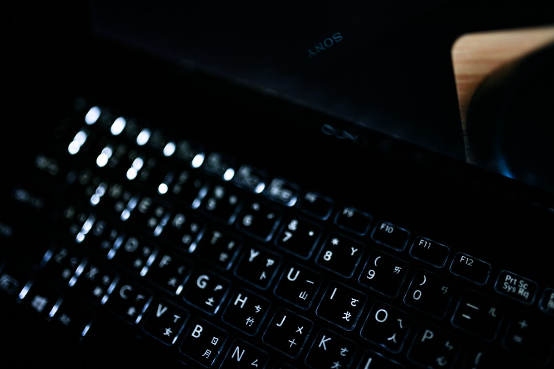 a close up of a keyboard and a mouse public wifi cybersecurity hackers travel laptop