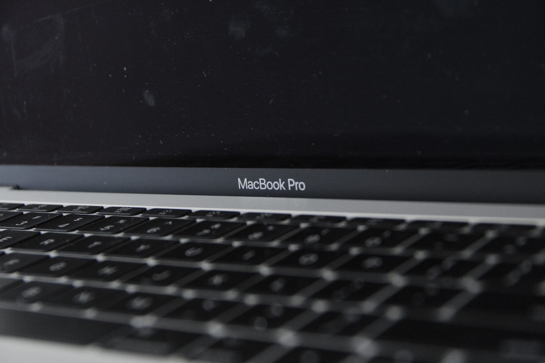 a close up of a macbook pro on a table vpn settings laptop browser