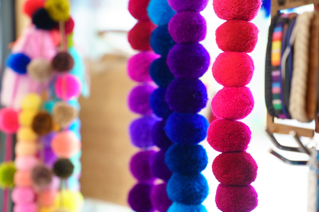 Success Stories: Online Stores Thriving with HostMonster eCommerce Hosting 3 a group of colorful balls handmade fashion ecommerce success knit products