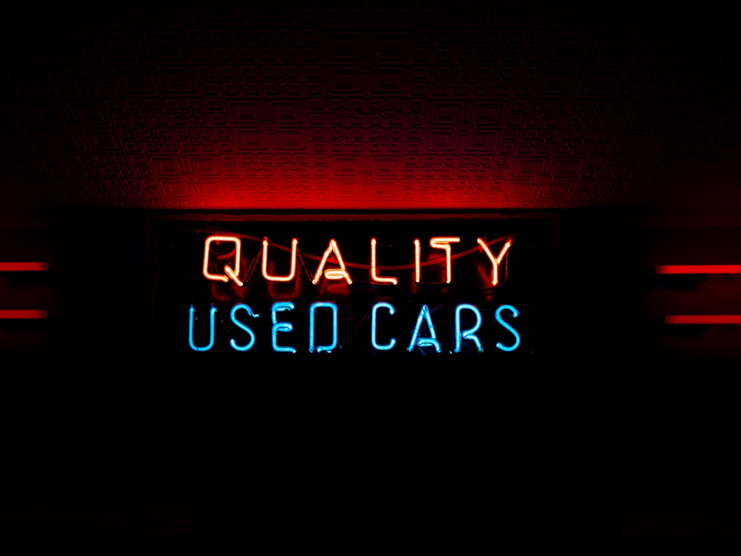The complete guide to automotive CRM in 2025 1 a neon sign that reads quality used cars car dealership crm software automotive technology