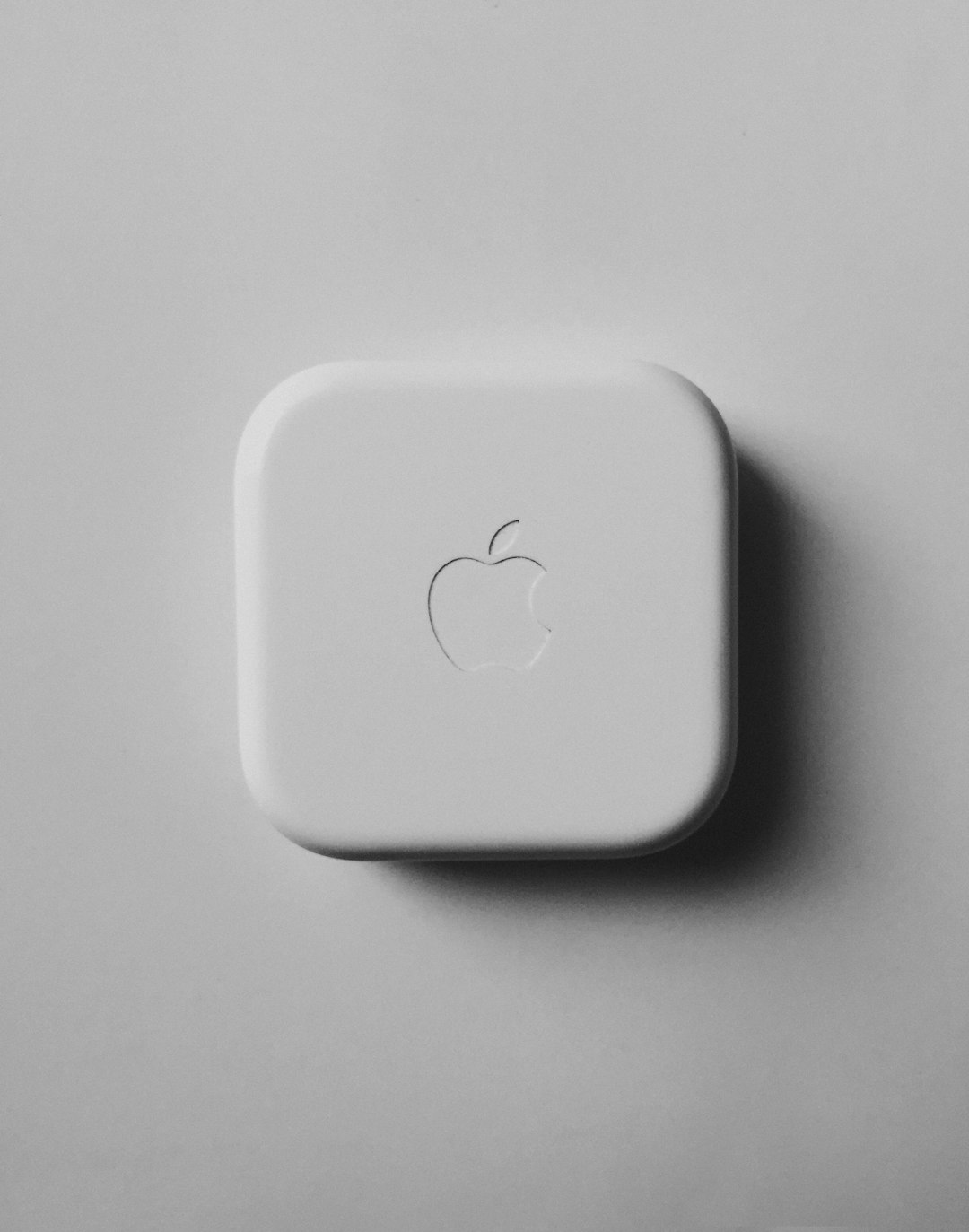 an apple logo is shown on a white surface vpn settings mac firewall iphone network settings