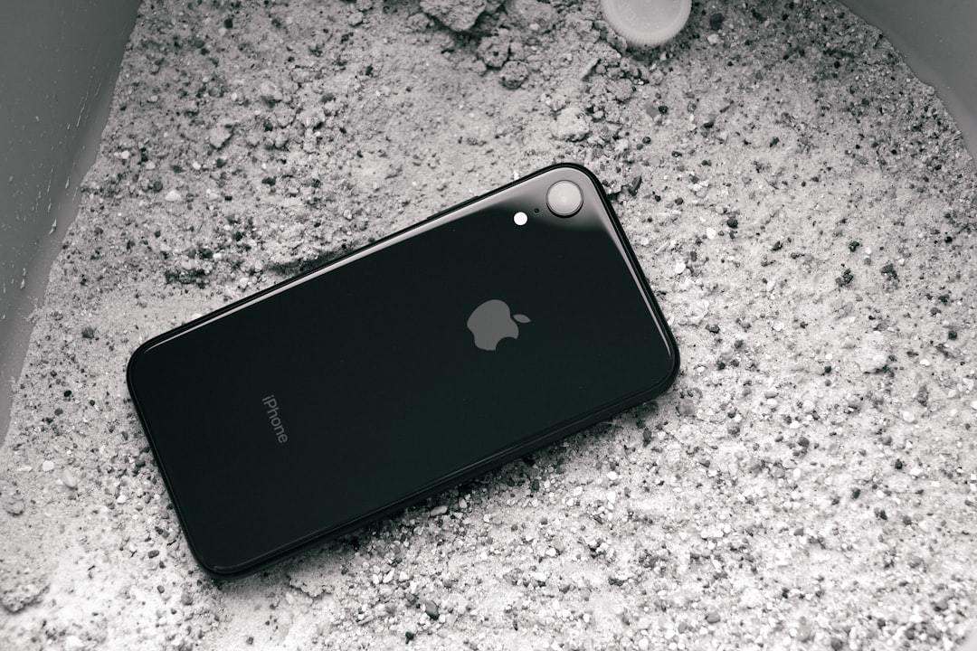 black iphone 7 plus on gray marble table macos finder iphone device sync
