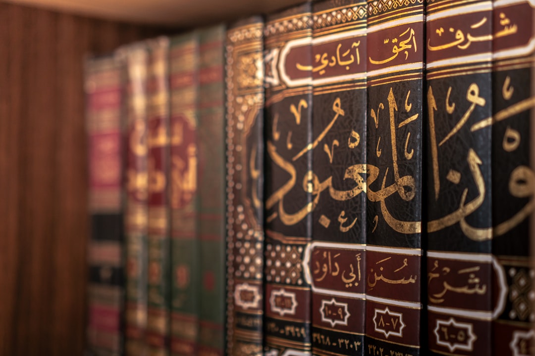 Academic Review: Siham Ouardi’s Google Scholar Contributions 2 books with arabic writing are displayed on a shelf scholarly conference history books islamic philosophy