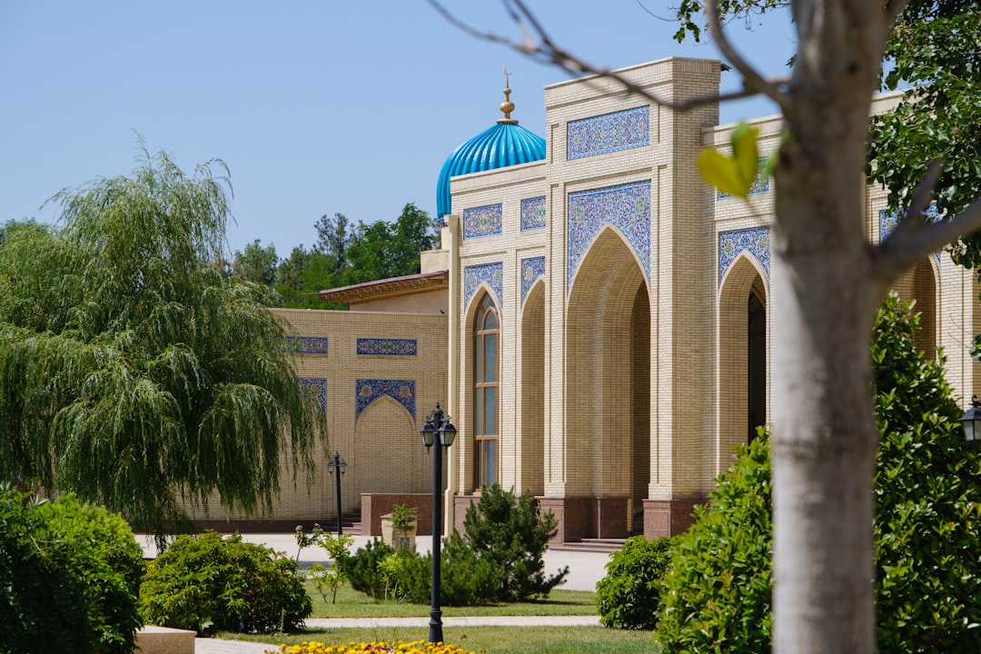 brown and blue concrete building scholarly conference history books islamic philosophy