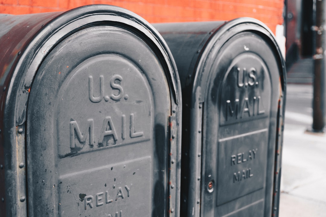 close view of two gray u s mailboxes spam filter email security microsoft