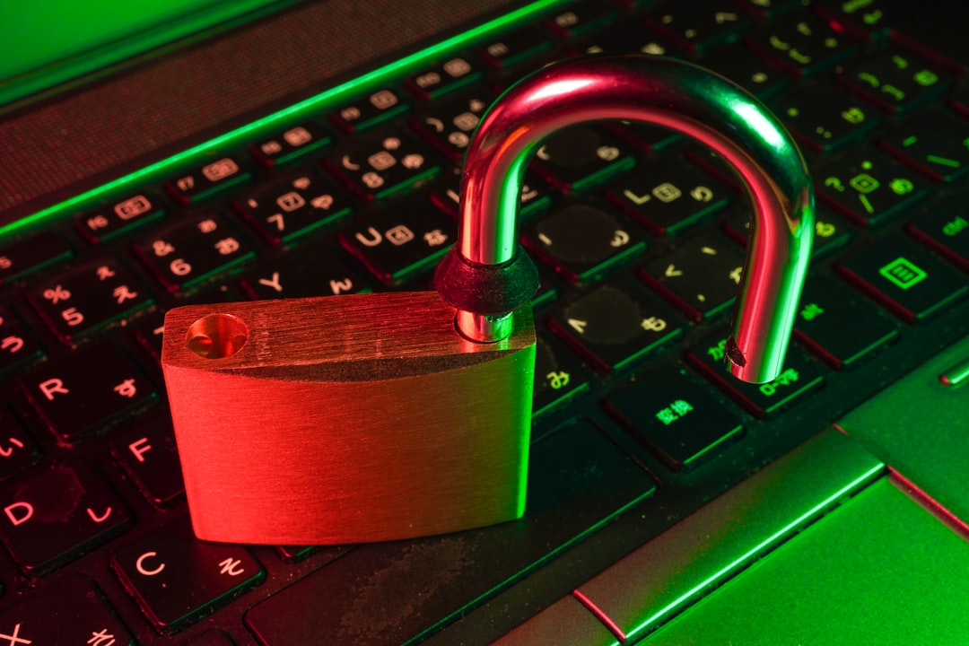 red padlock on black computer keyboard cybersecurity cissp information security