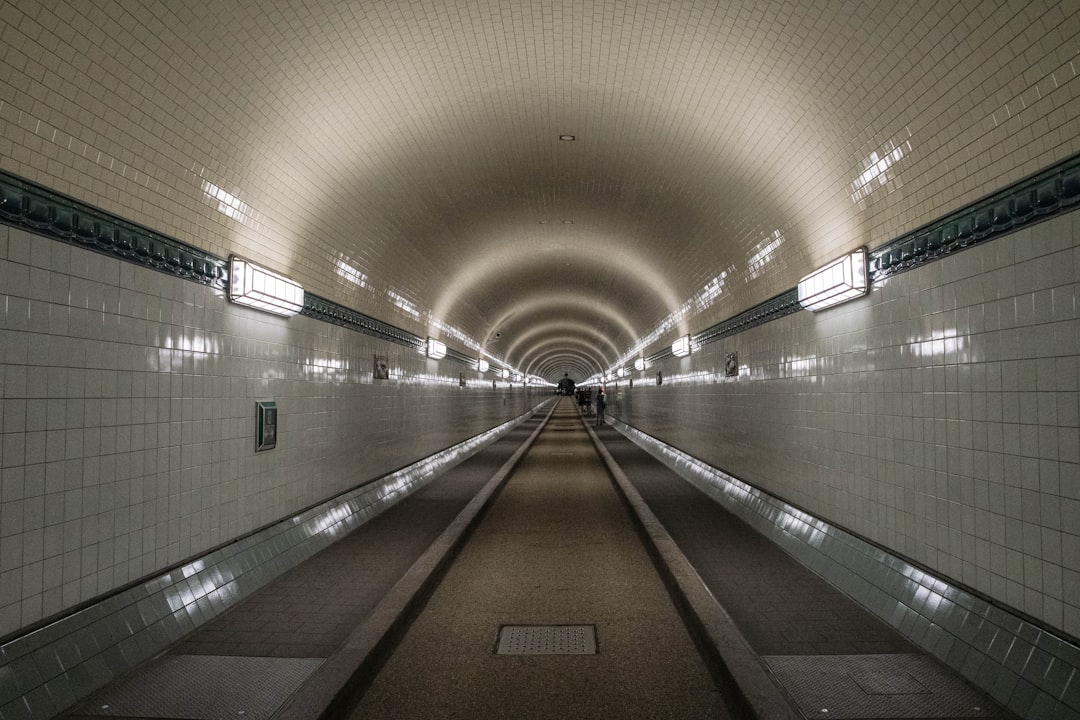 white and brown hallway with lights turned on in the middle vpn protocols tunnel types security comparison